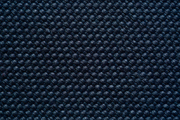 Black macro fabric texture,Fabric texture. Fabric background. Texture of rough black fabric. Macro image from canvas pattern