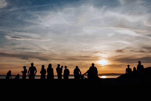 istock Silhouettes Against a Sunset Sky 2168619995