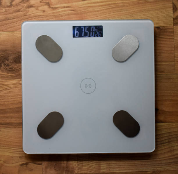 istock Top view of white scales displaying weight 2168625290
