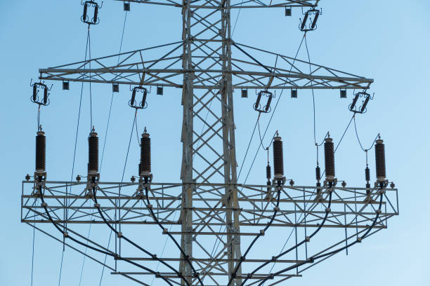 istock Power lines against blue sky. 2168628440
