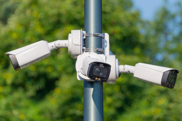 istock City surveillance cameras. Three cameras looking in different directions. 2168628703