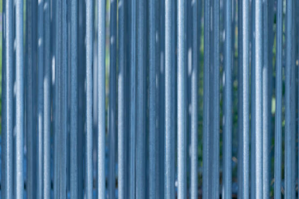 Metal fence. Vertical lines. Backgrounds and textures.
