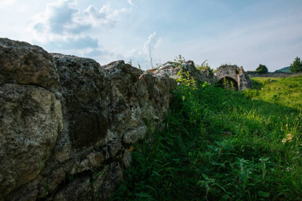 A haunting glimpse into history, the ruined walls of Zrin Fortress stand tall against the backdrop of Zrinska gora. The once-mighty stronghold, nestled amidst the Croatian countryside, bears the scars of time and conflict. The crumbling stonework, overgrown with vegetation, speaks of a bygone era, while the surrounding landscape evokes a sense of tranquility and resilience.