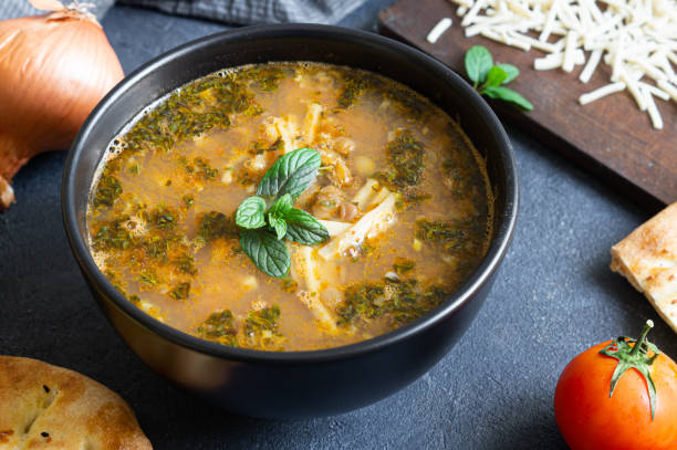 istock Traditional Turkish thin bar shaped dough soup, homemade noodle soup, bacakli corba 2168629367