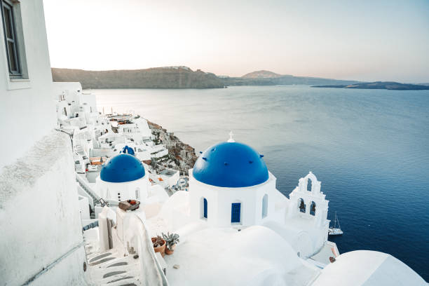 istock Santorini blue domed churches at sunrise 2168631771