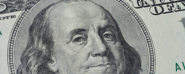 istock Fragment of a hundred dollar bill, macro 2168631849