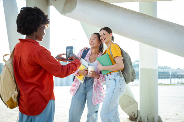 istock Female students having fun in the city 2168640095