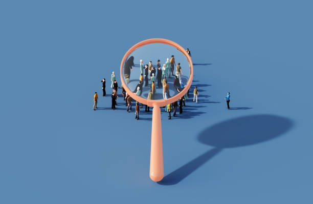 istock Magnifier Scrutinizing A Group Of People On Blue Background 2168642216