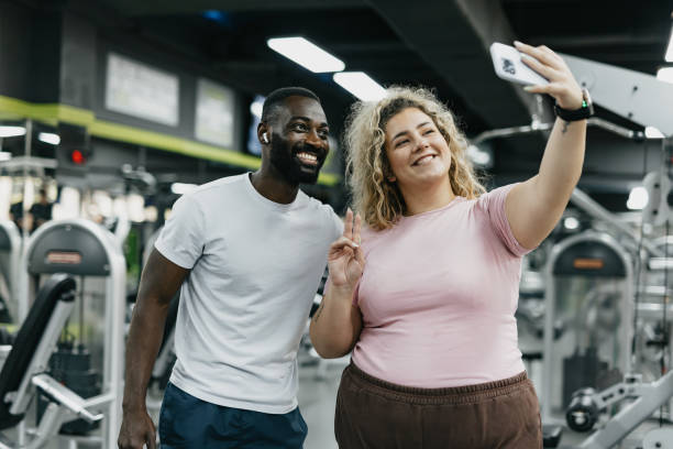 istock Happy friends taking selfie at the gym, workout session 2168645633