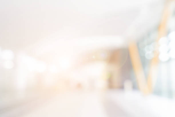 istock abstract blur contemporary office interior white background with morning shine light effect concept 2168645994