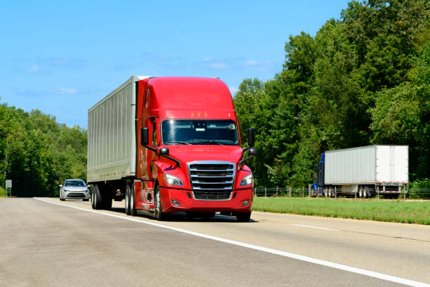 istock Red Eighteen Wheeler Semi On The Interstate With Copy Space 2168653231