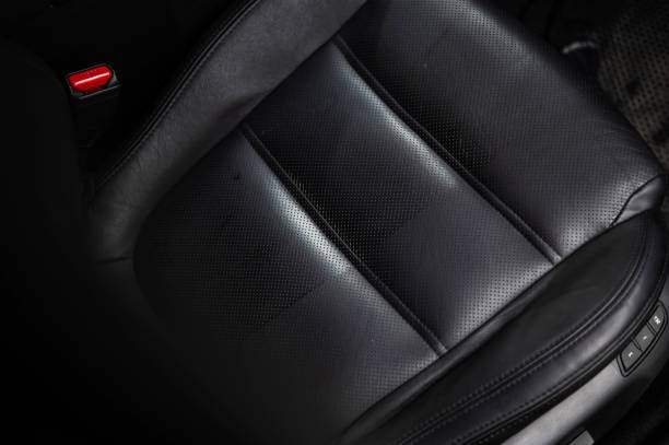 istock Close-up of black leather car seats. 2168655872