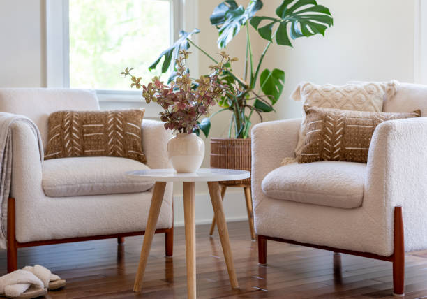 istock Sunny light and bright  living room corner with cozy chairs 2168660023