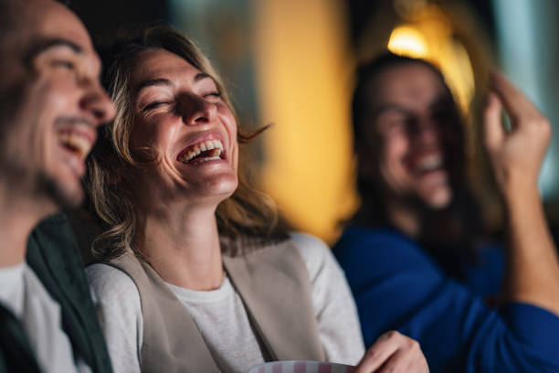 istock Happy Friends Laughing Together at a Fun Gathering 2168660292