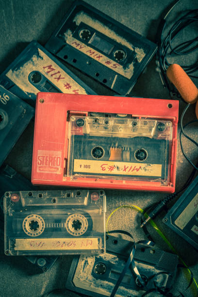 istock Old audio cassette with headphones and portable player 2168664364