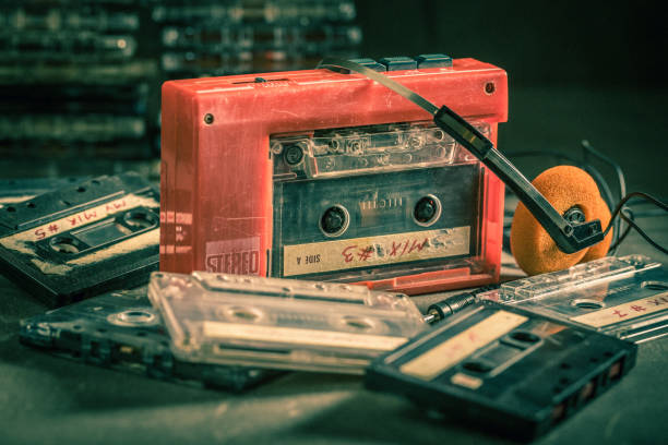 istock Cassette tape with headphones and portable player 2168665513