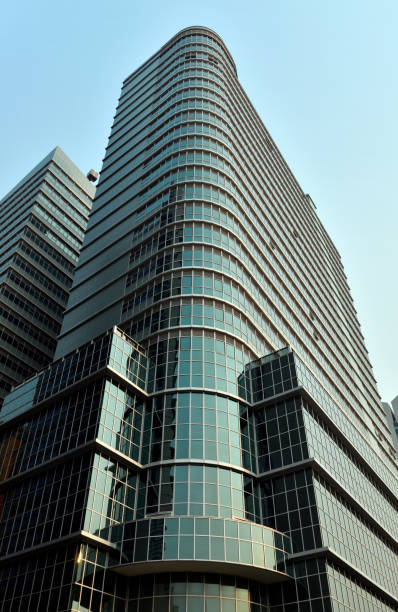 Luanda, Angola: looking up the glass façade of the Luanda Towers (Vista Club), a mixed-use high rise built over the razed buildings of colonial Luanda, Architecture by Doria Lopes Fiuza, engineering by Andrade Rezende. Major Kanhangulo Street.