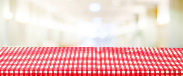 istock Food background, Empty table with red check table cloth over blurred cafe background, for product display montage banner, template, wallpaper 2168668771