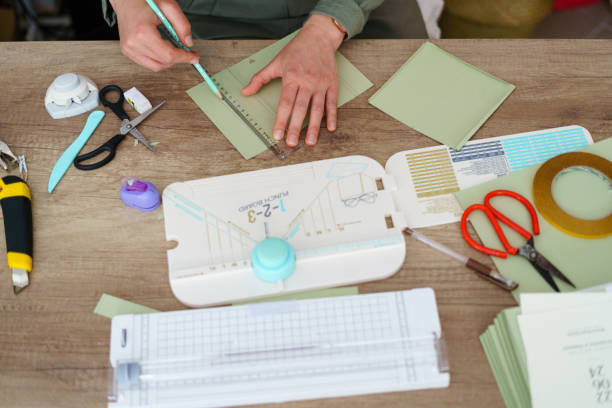 istock Small business owner making beautiful wedding invitation cards while working in her flower shop 2168671250