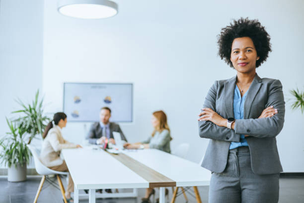 istock Confident employee standing with arms crossed 2168676123