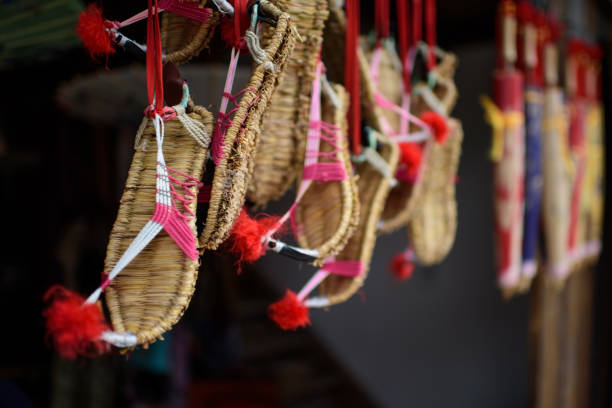 A woven slippers on wooden step natural footwear handmade comfortable indoor shoes arranged neatly