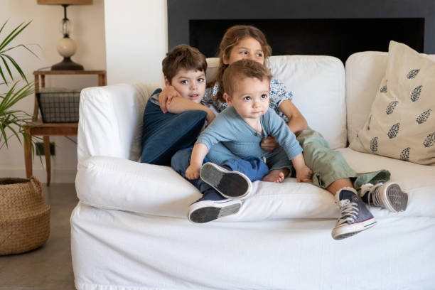 istock Portrait of three small sibings at home 2168688025