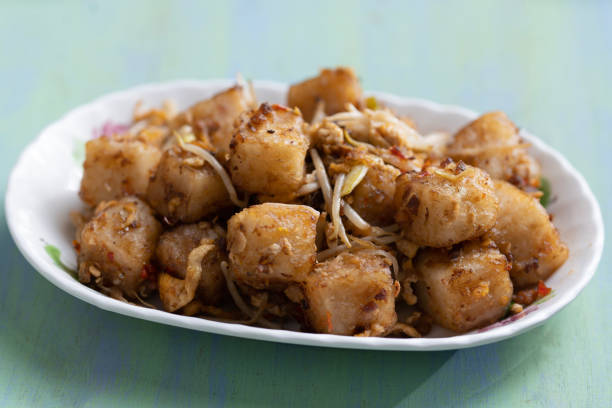 close up of a plate of chinese dim sum favorite fried radish cake