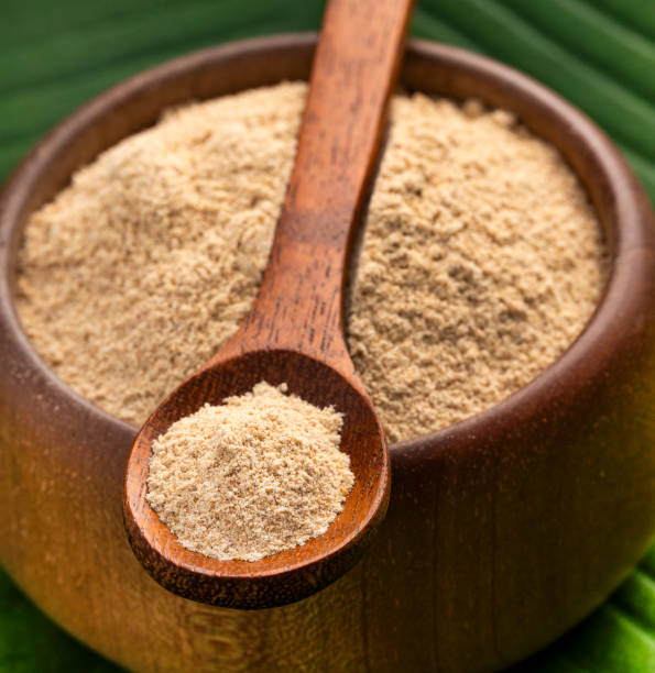 istock Organic Peruvian maca powder in the bowl and spoon - Lepidium meyenii 2168689666