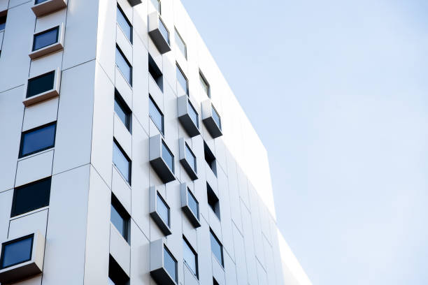 istock Modern office building exterior with window glass facade on clear sky background. Office building. Element of facade of modern European building in Gdansk Commercial 2168693019