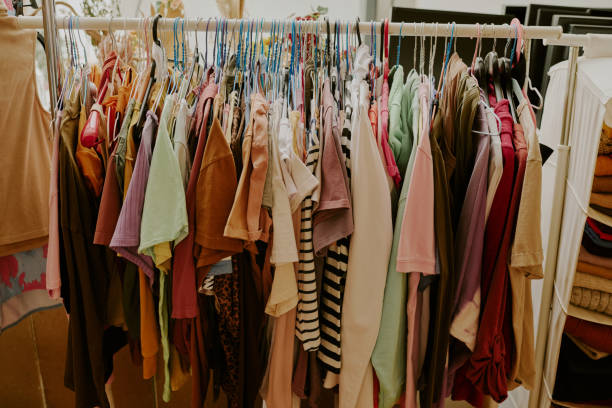 istock Varied Array of Clothes Hanging on Rack in Store 2168705438