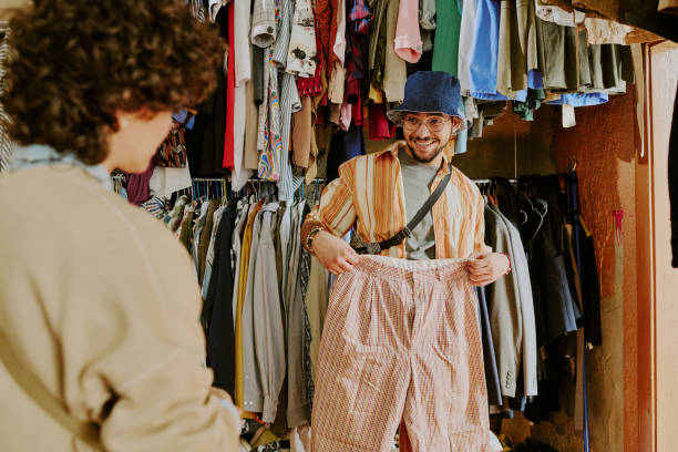 istock Enjoying Shopping Experience in Clothing Store 2168706480