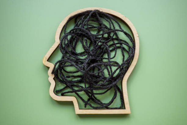 istock Outline of a head with black threads inside. This could symbolize stress and mental strain. 2168710678