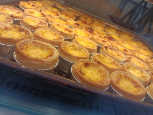 istock Portuguese egg tart with carmelized burnt top on custard 2168714810