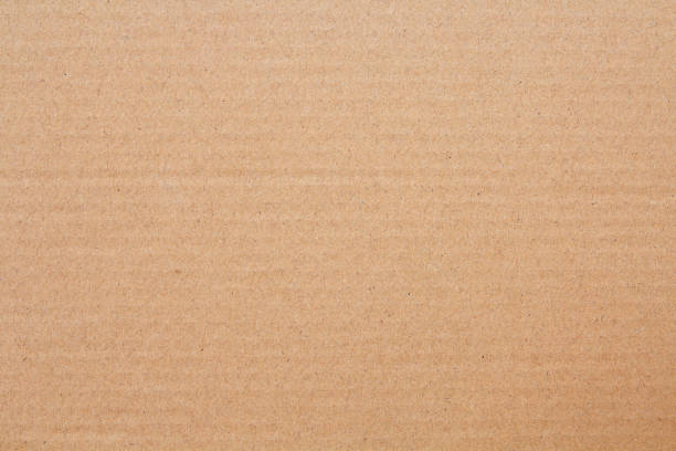 istock Cardboard sheet texture background, detail of recycle brown paper box pattern. 2168728047