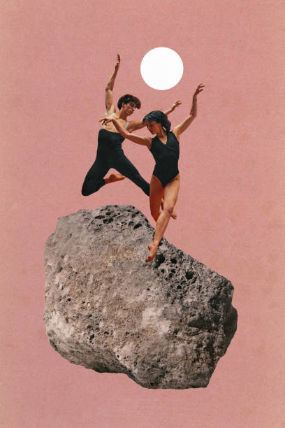 istock Two dancers elegantly dancing atop rugged rock, silhouetted against soft pink background with bright white sun. Contemporary art collage. 2168728537