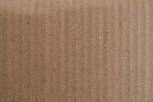 Texture of brown paper box or cardboard background.