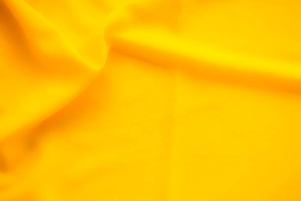 Crumpled yellow texture background