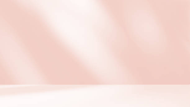 istock Empty pink colour room studio with sunlight effect shadow on the floor and wall for product presentation. 2168739295