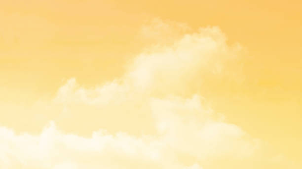 istock Orange yellow golden pastel sky with white cloud. 2168739341