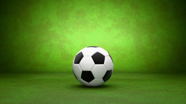 istock A Realistic 3D Soccer Ball Presented on a Vibrant Green Background, Creating an EyeCatching Visual Appeal 2168740649
