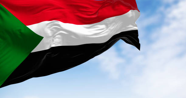 istock Sudan national flag waving in the wind 2168743349