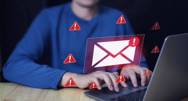 istock Alert Email inbox and spam virus with warning caution.Threat, phishing, malicious, danger, hack, warning, mail, thief, scam, alert, safety, letter, technology, online, Cyber crime security concept. 2168752328