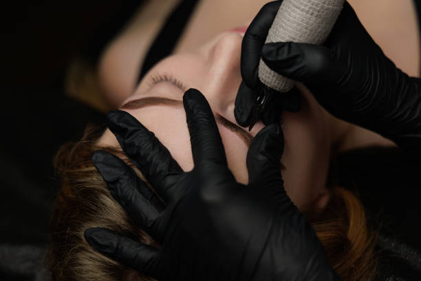 istock Permanent eyebrow makeup, eyebrow tattooing with brown pigment for PMU. 2168755601