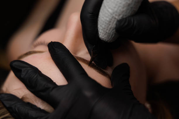 istock Permanent eyebrow makeup, eyebrow tattooing with brown pigment for PMU. 2168755716