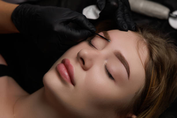istock Permanent eyebrow makeup, eyebrow tattooing with brown pigment for PMU. 2168755847
