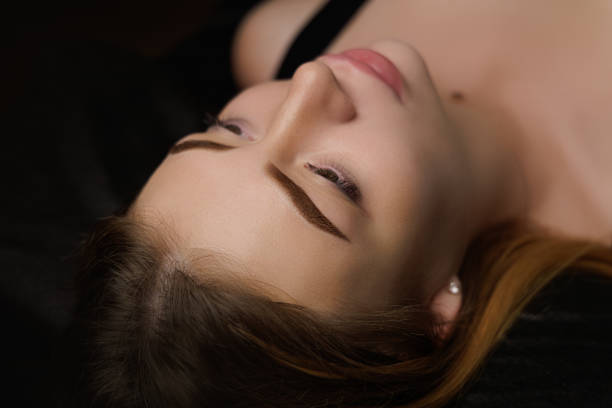 istock Permanent eyebrow makeup, eyebrow tattooing with brown pigment for PMU. 2168756069