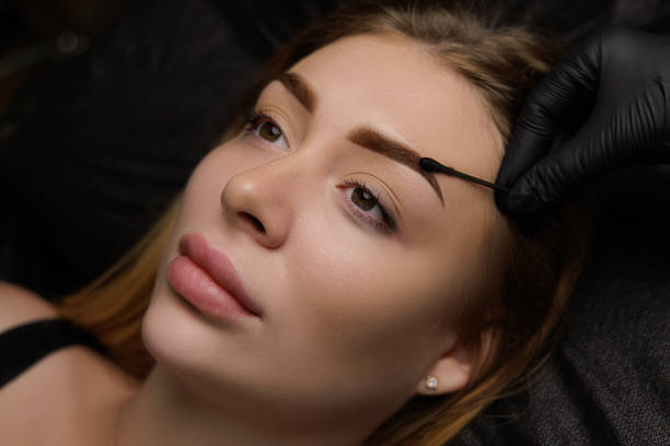 istock Permanent eyebrow makeup, eyebrow tattooing with brown pigment for PMU. 2168756073