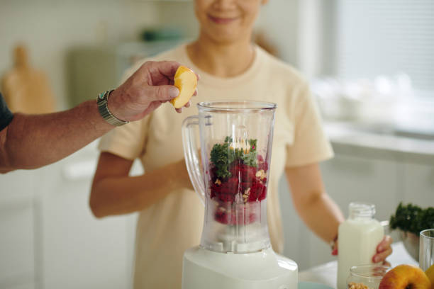 istock Preparing Healthy Smoothie with Fresh Ingredients 2168756990