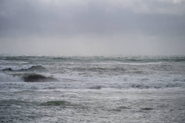 istock Rough ocean waves on a cloudy afternoon 2168759852