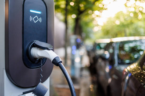 istock Charging EV at the station with cable plugged in 2168761980